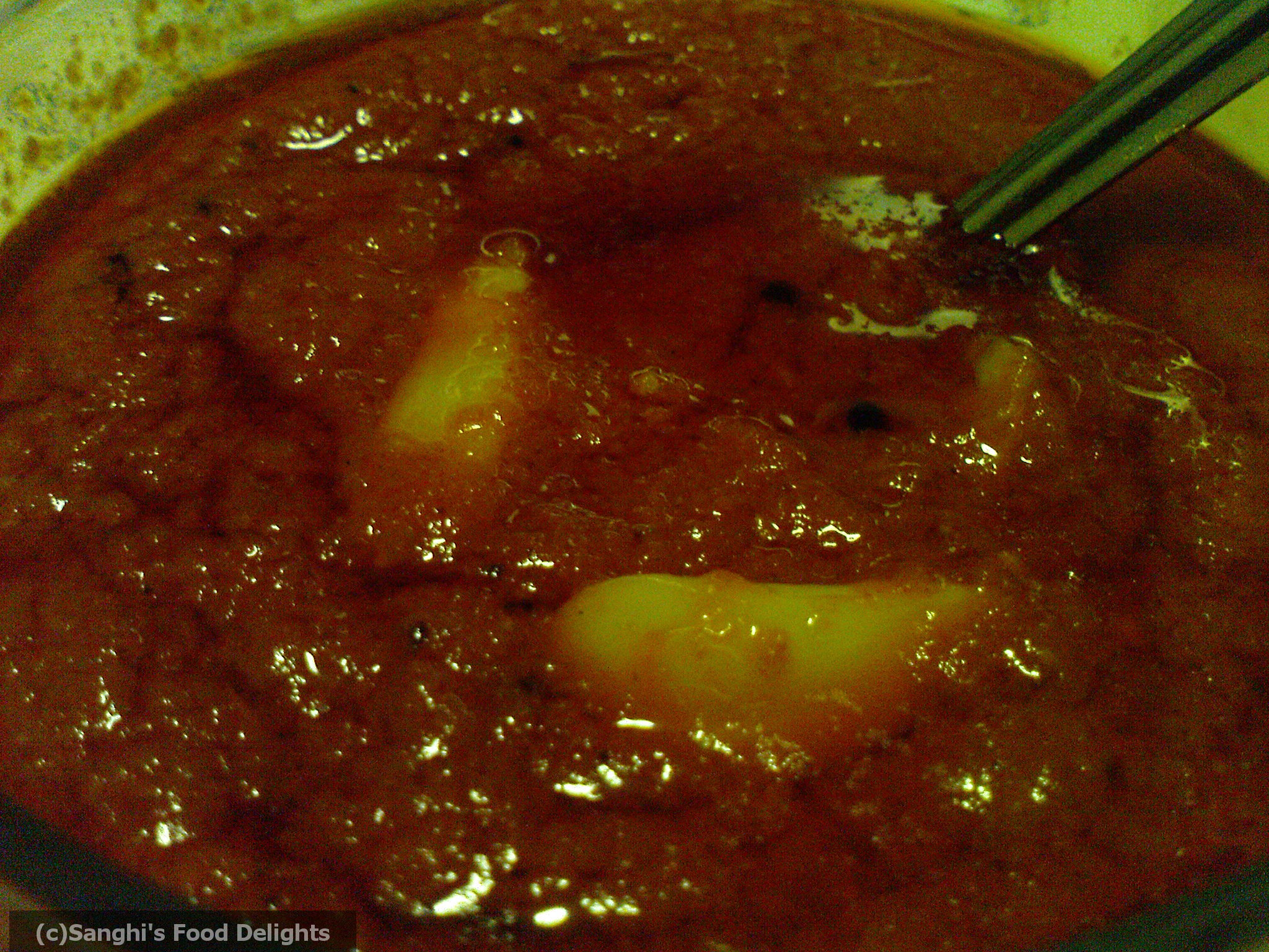 Thakkali Poondu Thokku