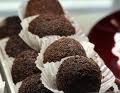 cake balls made out of scrambled cakes pieces dipped in chocolate