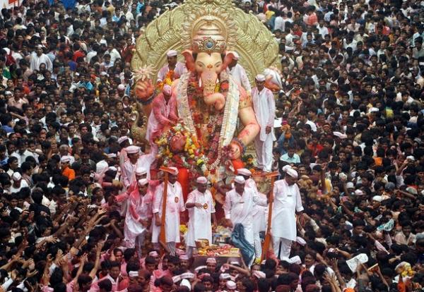In India, Cricket = Religion